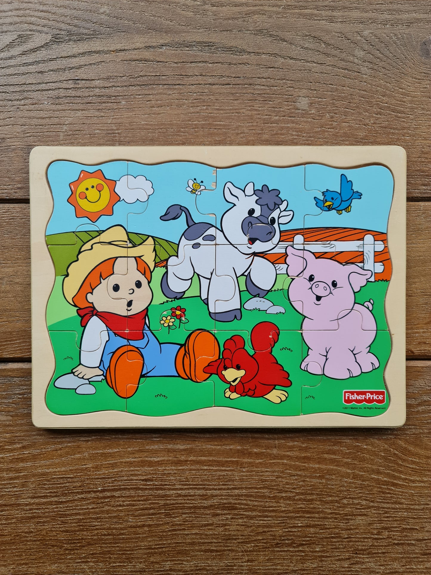 Houten puzzel 12st Fisher Price