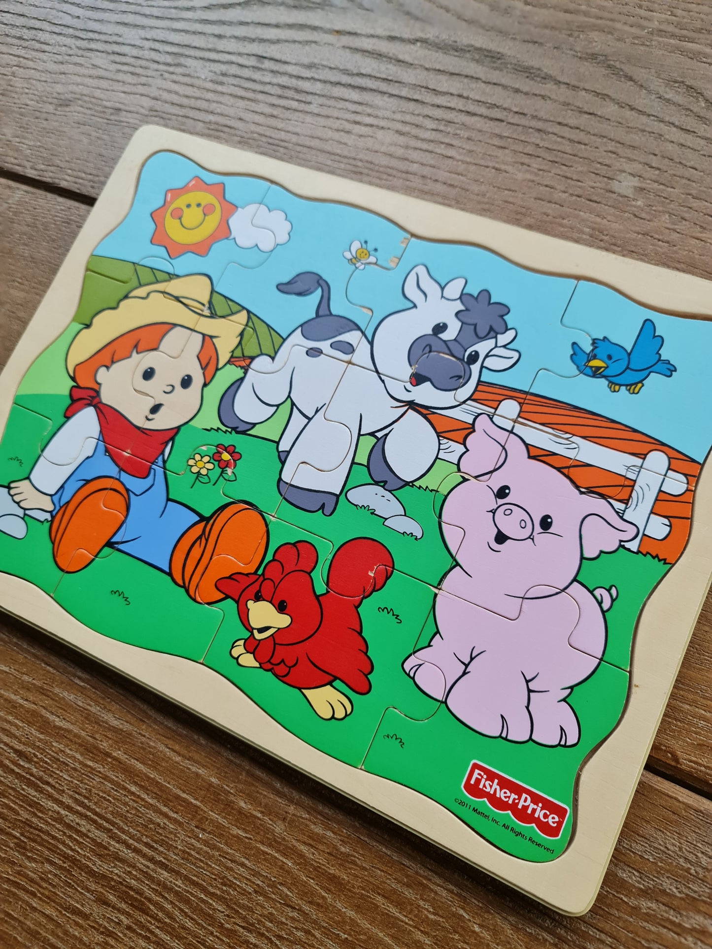 Houten puzzel 12st Fisher Price