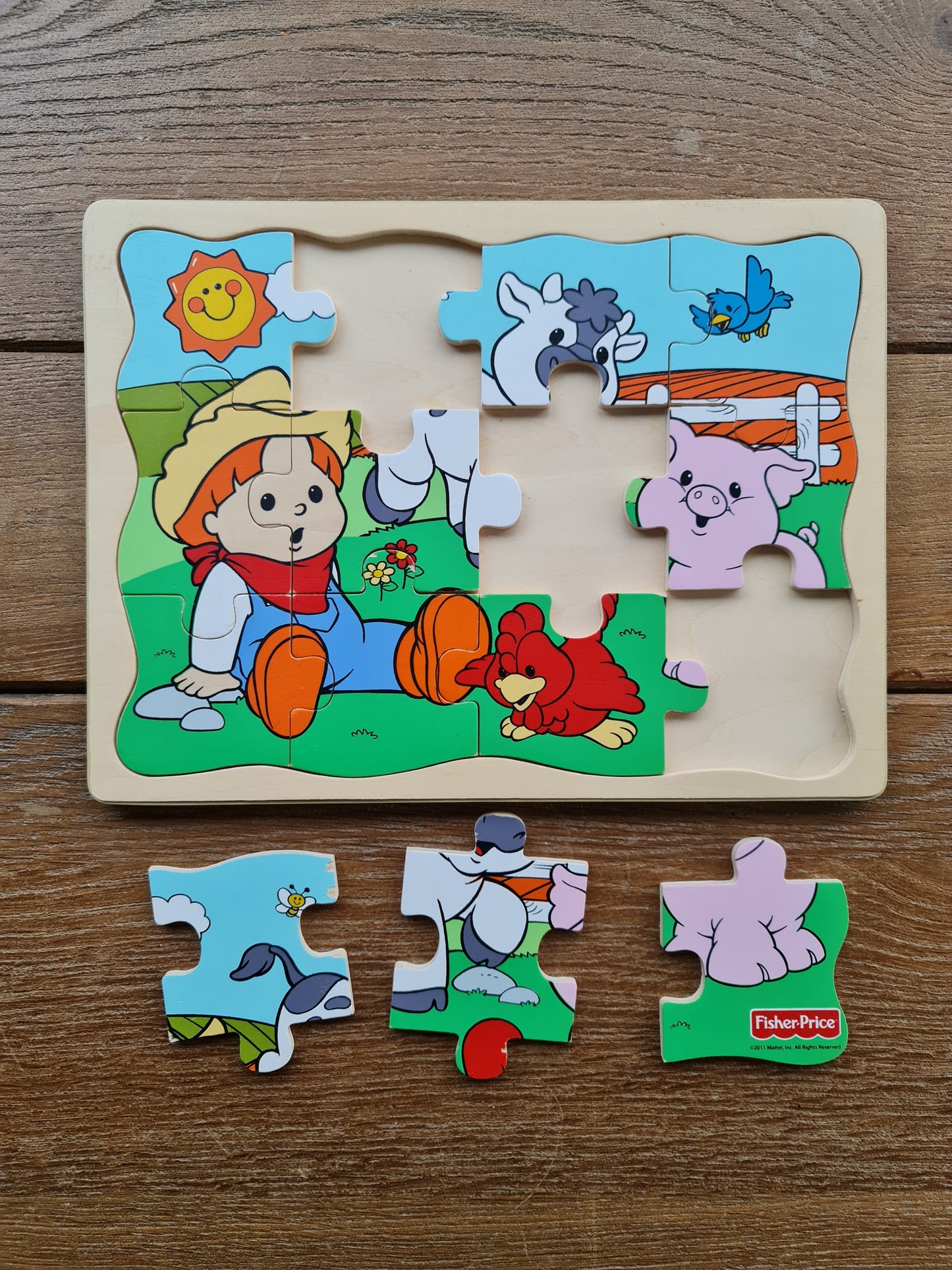 Houten puzzel 12st Fisher Price