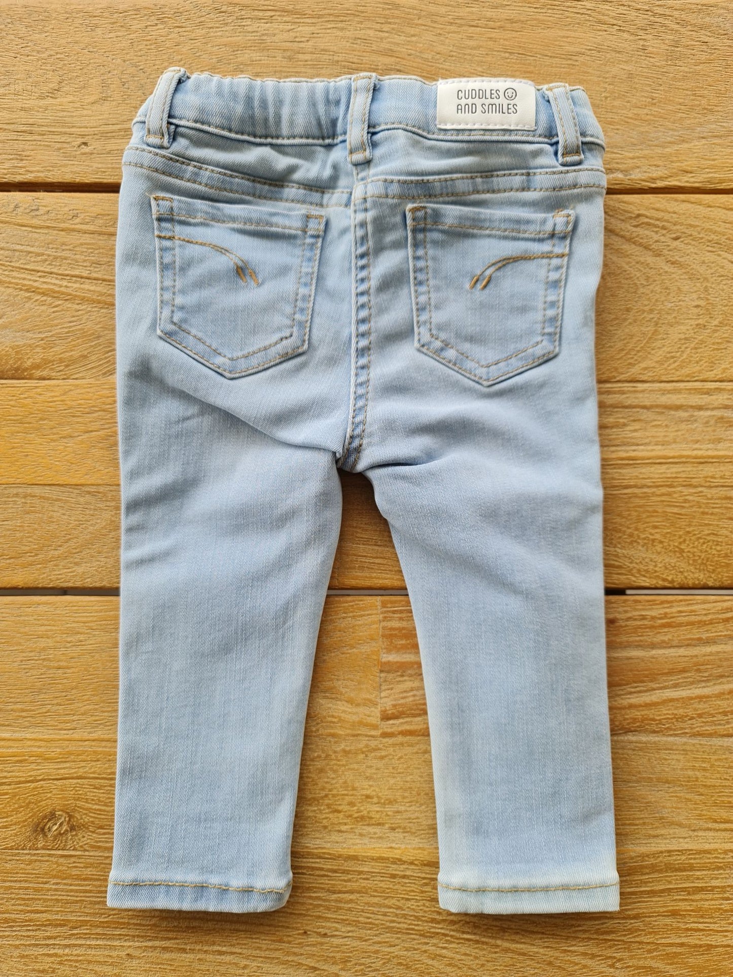 Jeansbroek 74 Cuddles and smiles