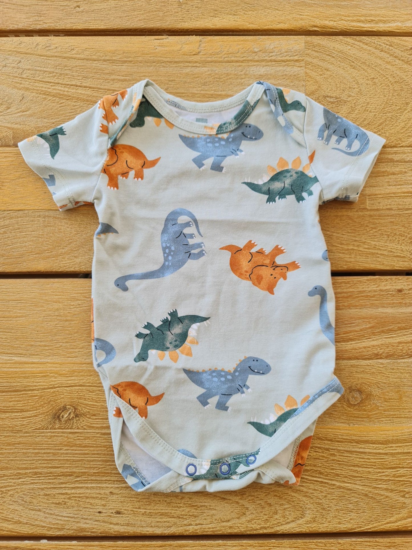Romper met dino's 50 Hema