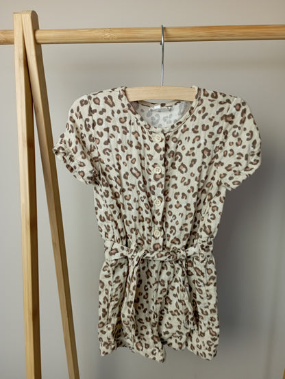 Leopard playsuit 86 Cuddles and smiles