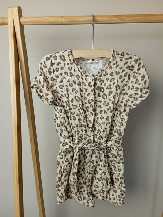 Leopard playsuit 86 Cuddles and smiles