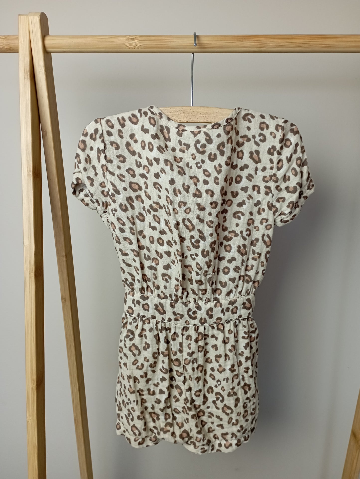 Leopard playsuit 86 Cuddles and smiles