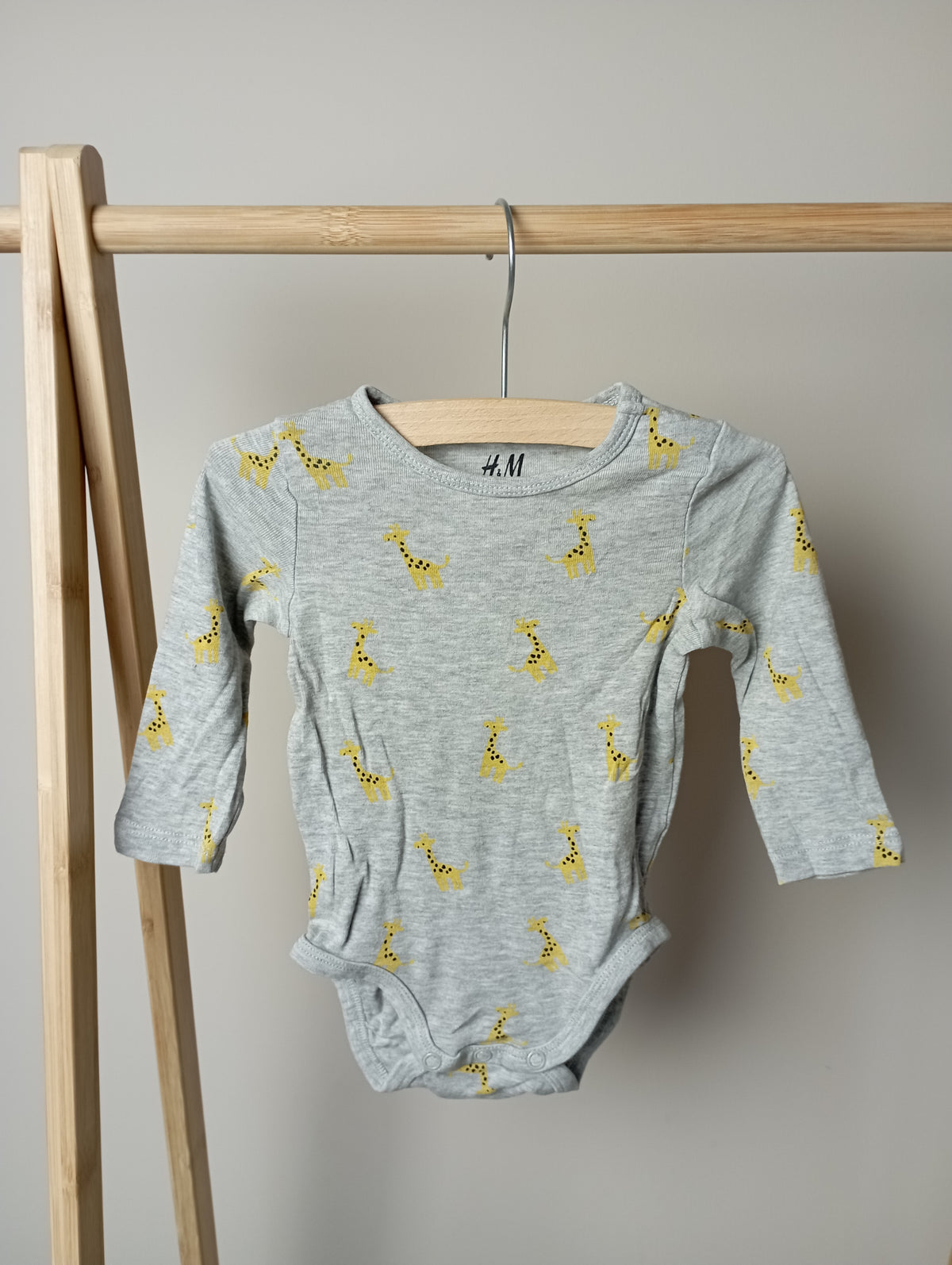 Romper met giraffen 68 H&M