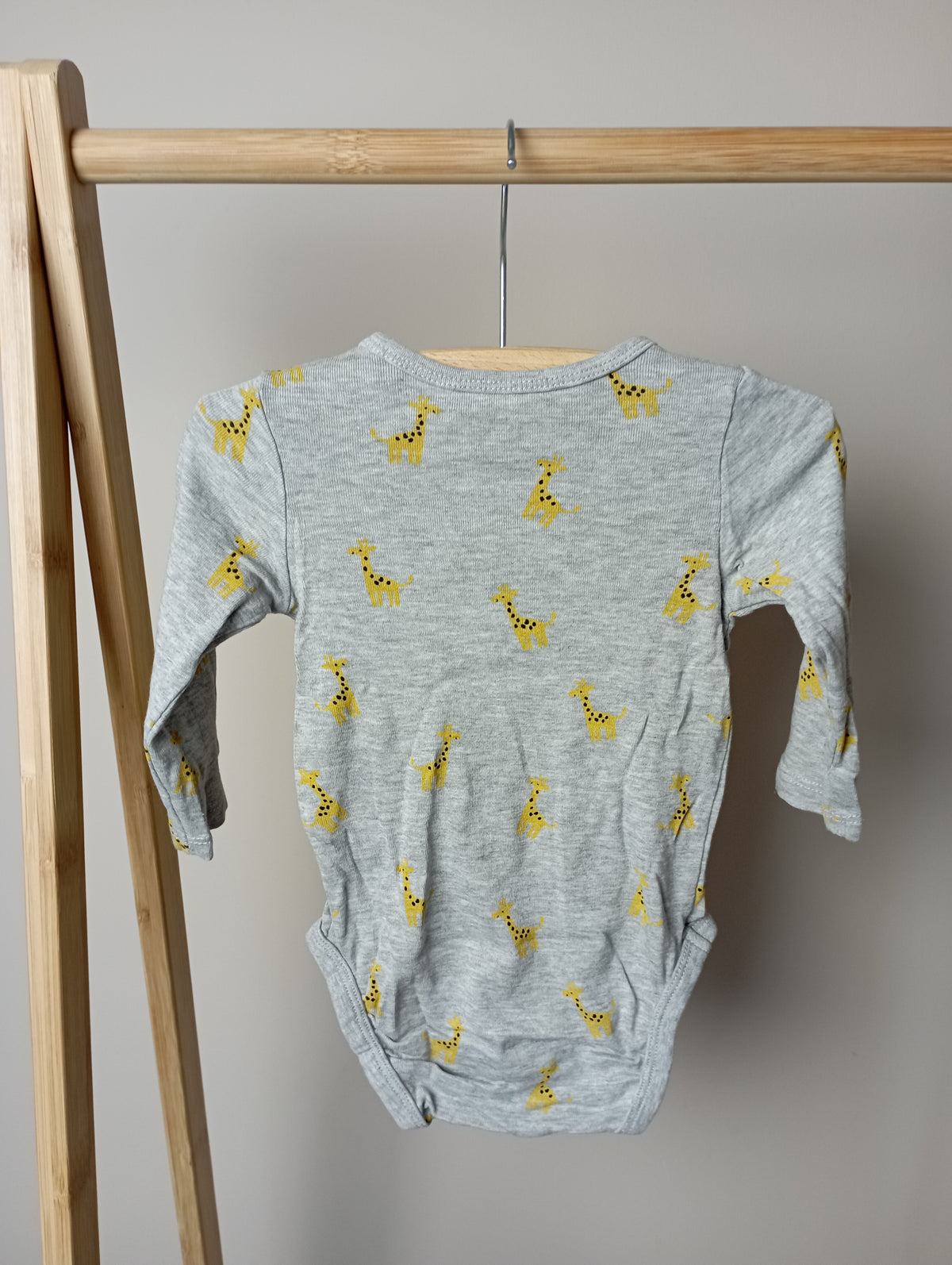 Romper met giraffen 68 H&M