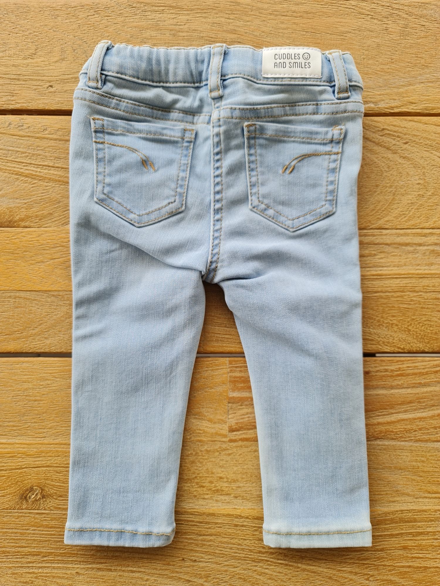 Jeansbroek 74 Cuddles and smiles
