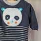 Warm pakje met panda 74 Orchestra